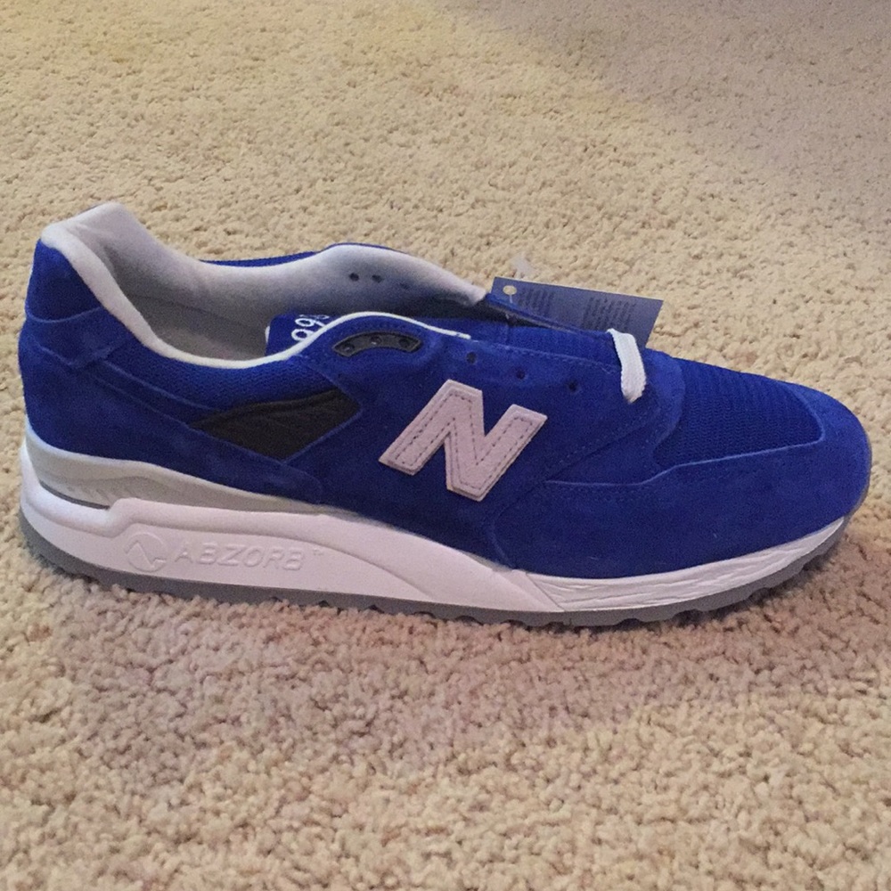 new balance men’s tennis shoes